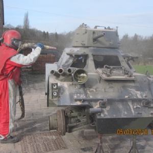 View Sandblasting a tank