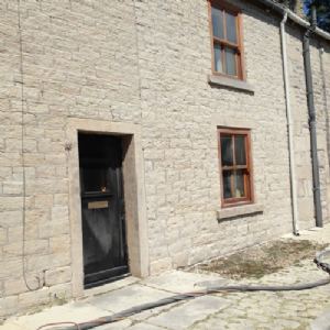 View Stone house after blast cleaning