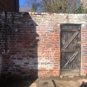 View Garden wall before sand blasting