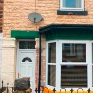 View Terraced house before